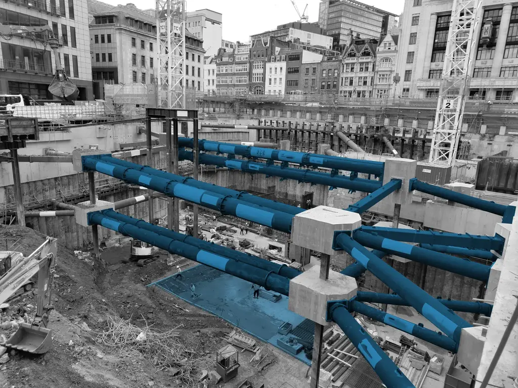 Deep basement excavation on a central London development, propped with large-diameter temporary steel struts